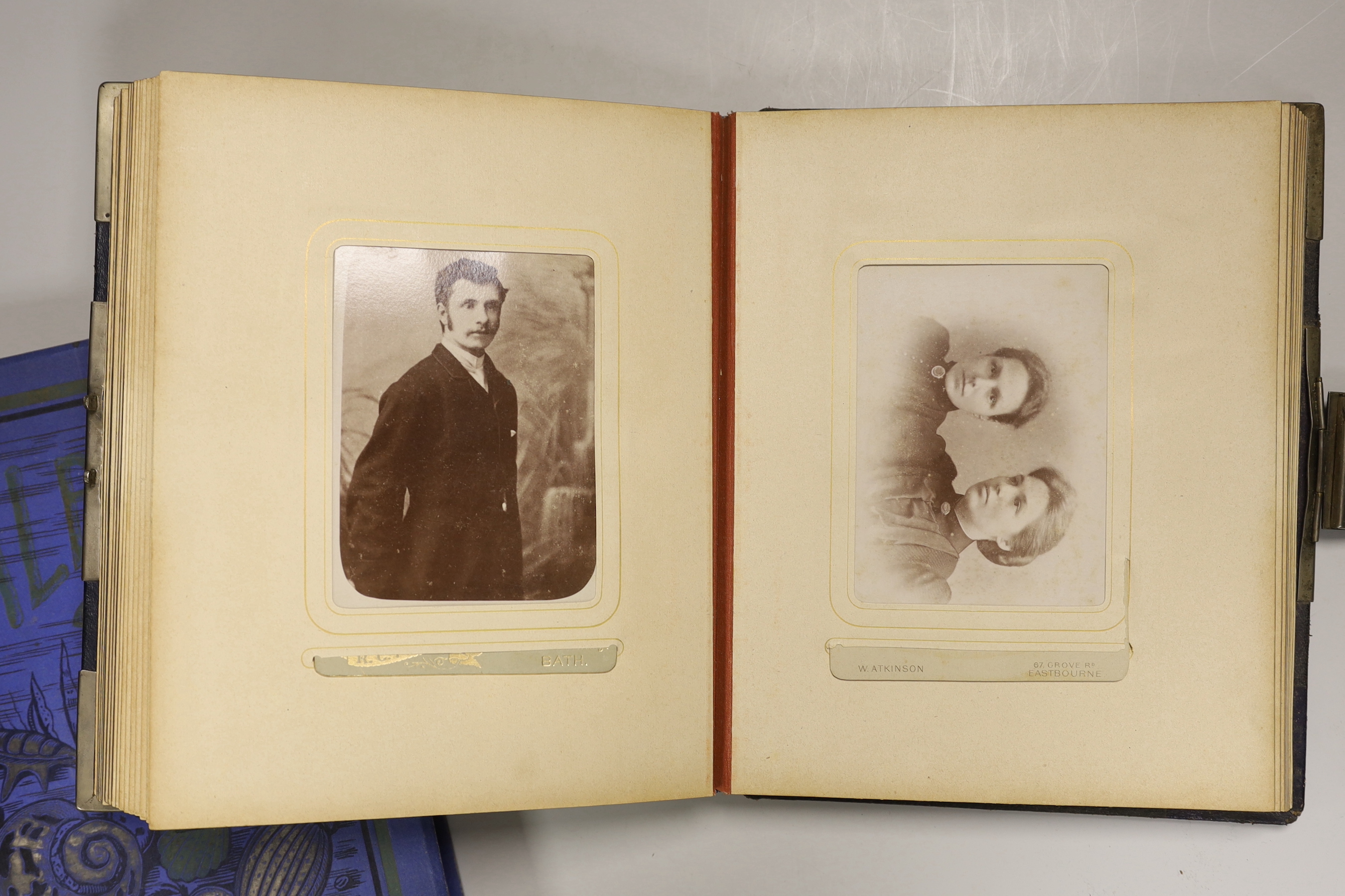 A Victorian photograph album and contents together with an Edwardian scrap book (2)